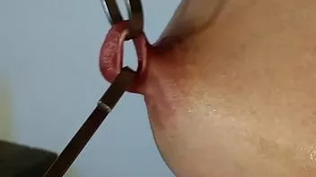 Putar Nippleringlover ibu keriting meregangkan tindik puting dengan kait hingga 17mm close up